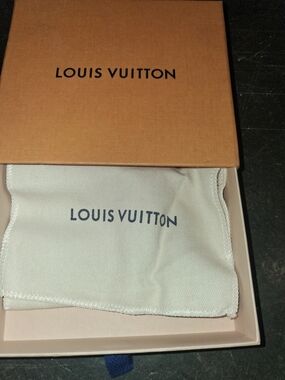 Louis Vuitton storage box and dust bag, typically used for accessories wallets